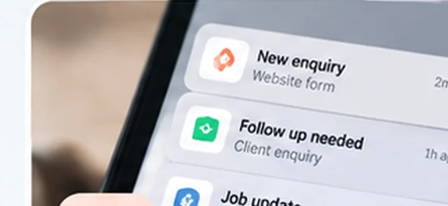 A phone showing new enquiries and follow-up reminders arriving